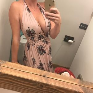 Long-line floral halter-neck dress with rope chain waist detail.